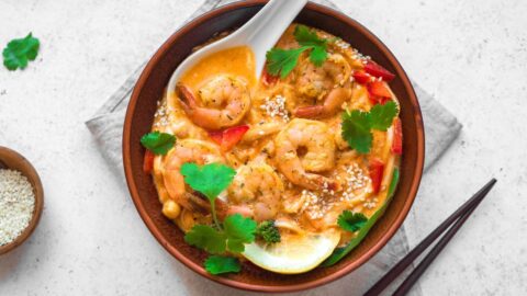 Warm Homemade Shrimp Soup with Noodles and Herbs