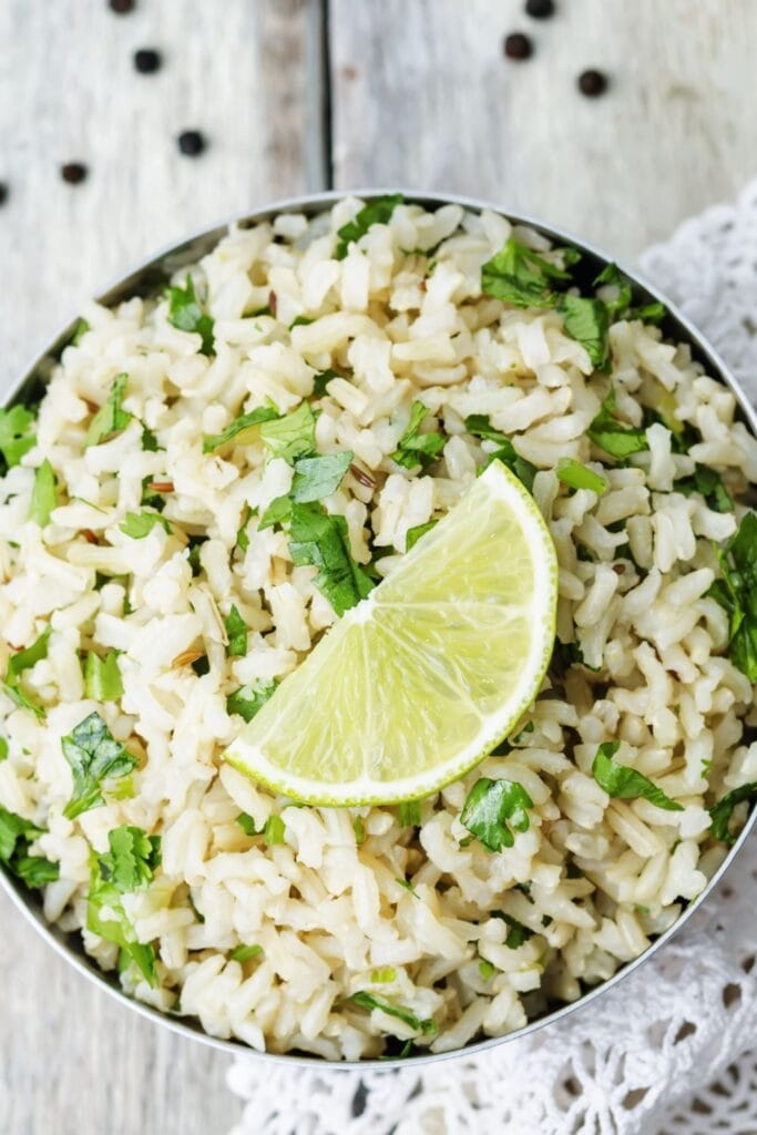 Cilantro Lime Jasmine Rice in a Bowl with a Lime Wedge