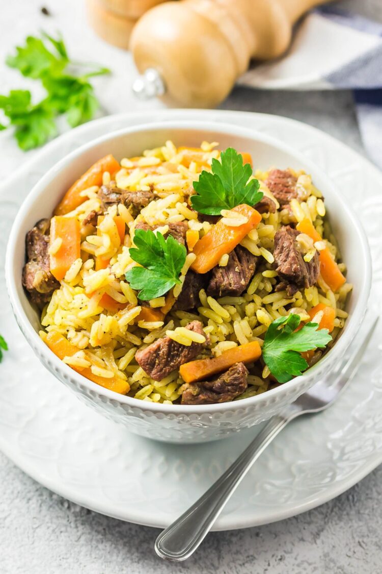 25 Best Wild Rice Recipes To Put On Repeat Insanely Good   Wild Rice Pilaf With Beef In A Bowl 750x1125 