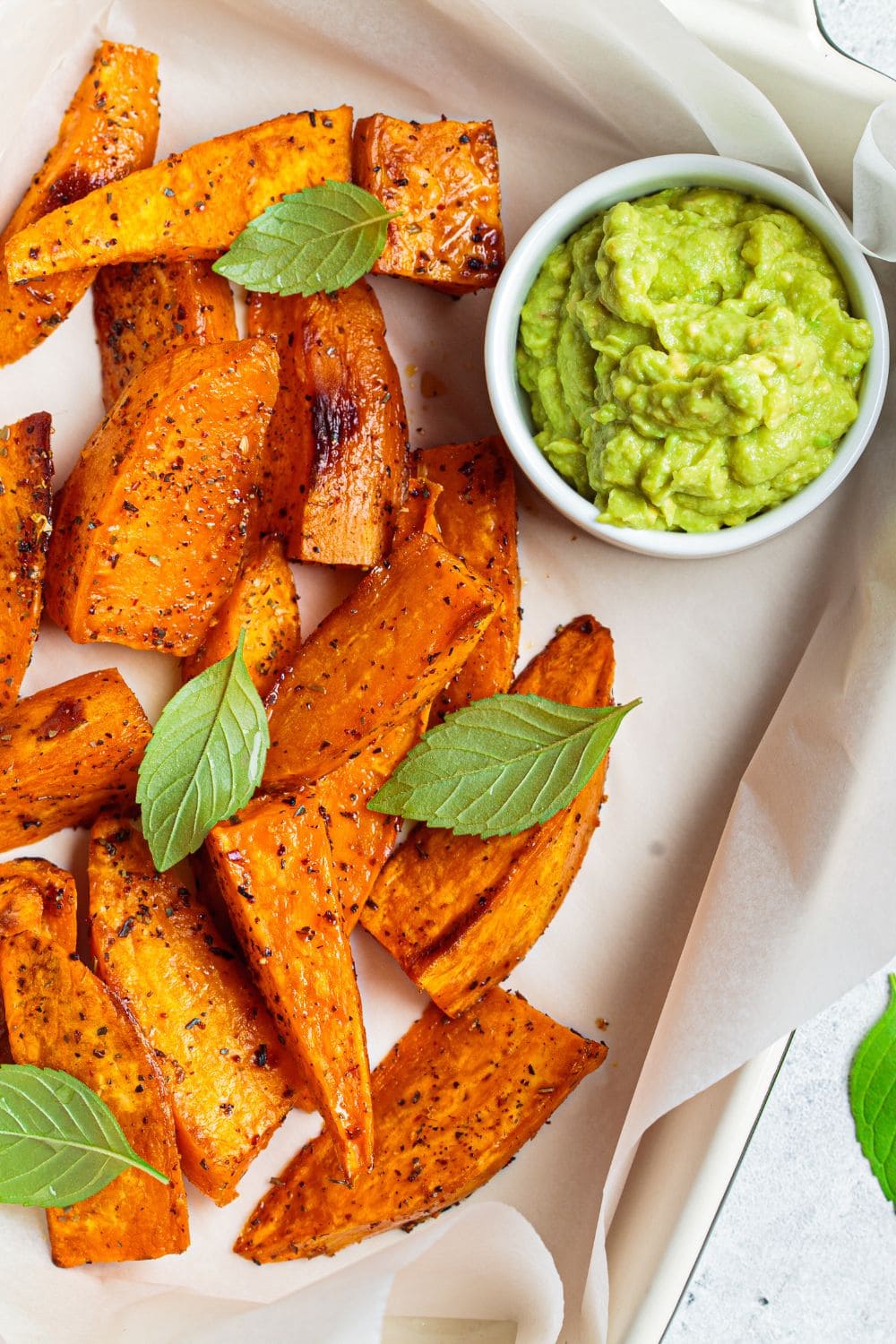 10 Best Dipping Sauces for Sweet Potato Fries. Shown in picture: Baked Sweet Potatoes with Avocado Dip