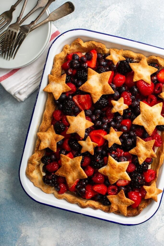 15 Slab Pie Recipes Perfect For a Hungry Crowd. Shown in picture: Berry Slab Pie with Decorated Stars