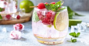 Boozy Homemade White Claw Hard Seltzer with Raspberries and Lime