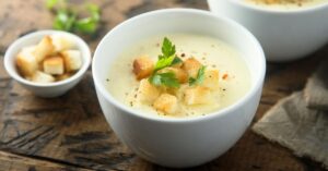 Bowl of Homemade Cheese Soup with Croutons
