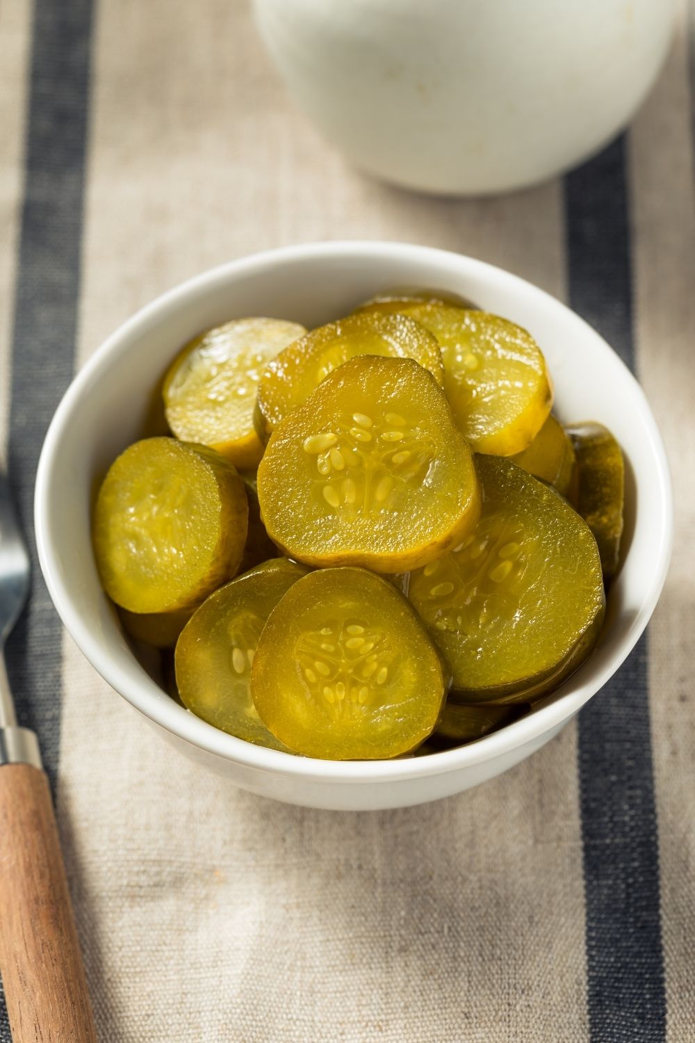 Fresh and Organic Pickle Chips in a White Bowl