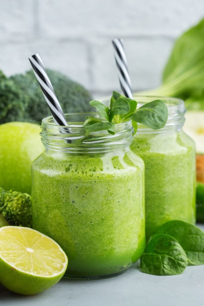 15 Smoothie Recipes for a Delicious Energy Boost. Shown in picture: Healthy Green Smoothies with Lime, Kiwi and Vegetables