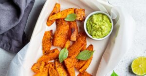 Homemade Baked Sweet Potatoes with Avocado Dip and Lime