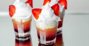 Homemade Boozy Strawberry Vodka with Whipped Cream