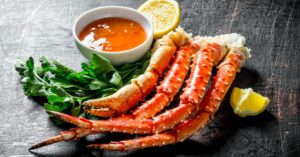 Homemade Crab Legs with Hot Sauce, Lemon and Parsley