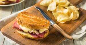 Homemade Texas Toast Reuben Sandwich with Cheese, Mustard and Chips