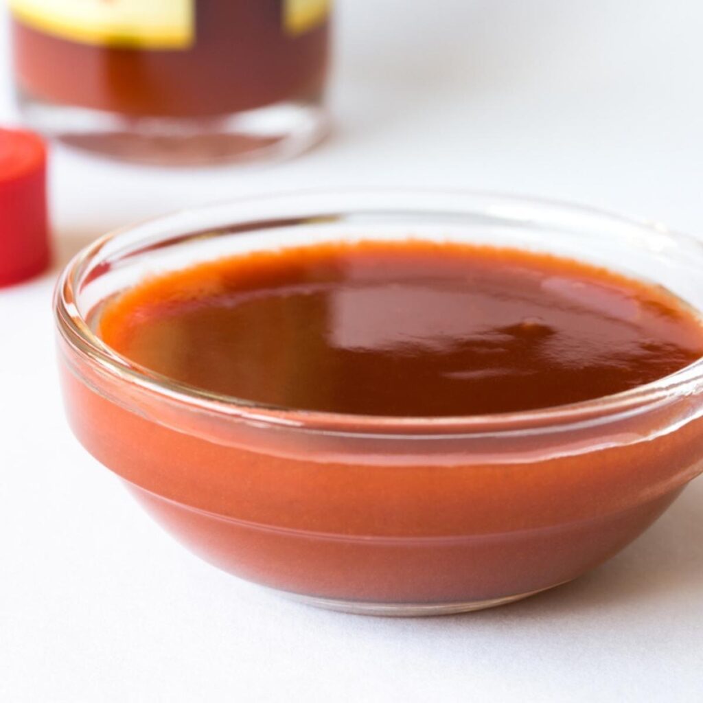 Hot Sauce in a Small Glass Dish
