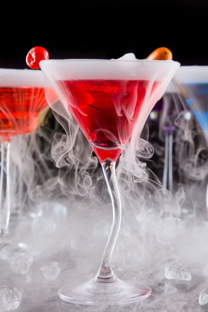 Multi-Colored Dry Ice Cocktails with Berries