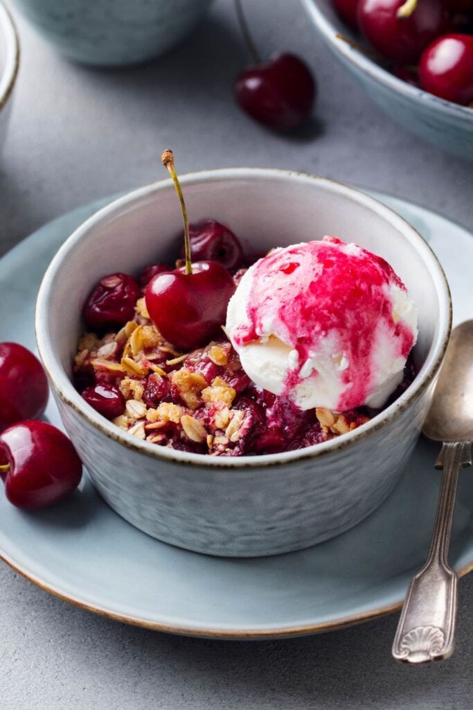 25 Crumble Recipes You'll Crave Again and Again. Shown in picture: Red Berry Crumble with Ice Cream