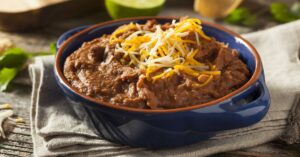Refried Beans with Chips, Cheese and Lime