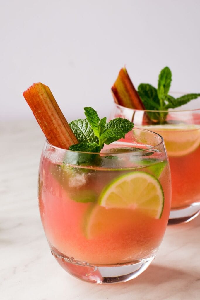 13 Rhubarb Cocktails for a Sweet Spring Shindig. Shown in picture: Rhubarb Cocktail with Lime and Mint