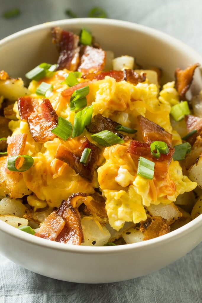 Scrambled Egg with Bacon and Green Onions in a Bowl