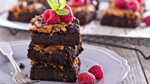 Stacked Homemade Chocolate Peanut Butter Brownies with Raspberries