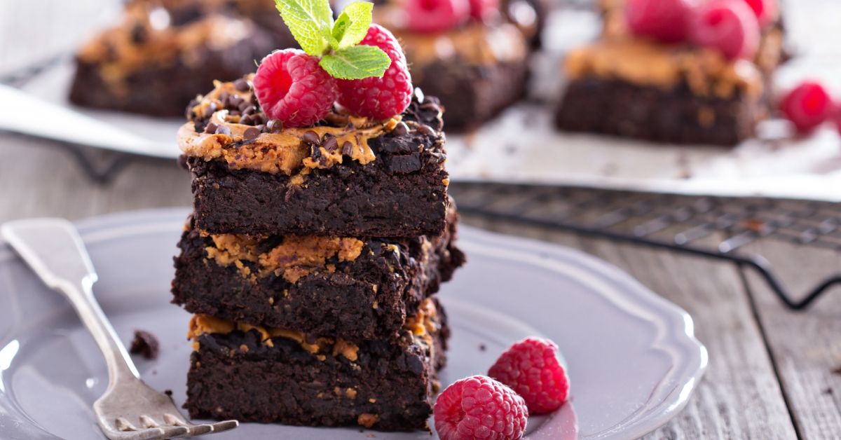 Stacked Homemade Chocolate Peanut Butter Brownies with Raspberries