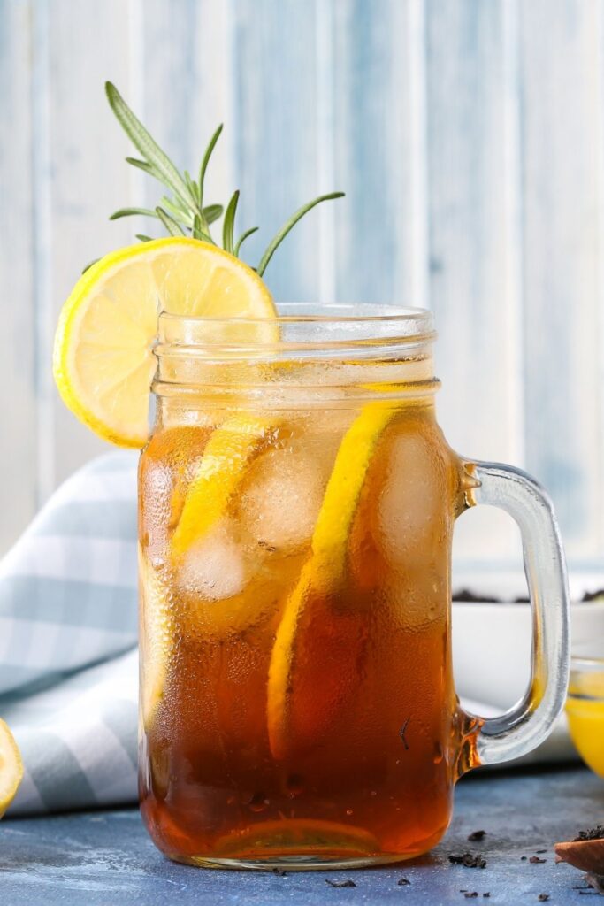 Sun Tea with Ice and Lemons in a Mason Jar