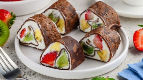 Sweet Homemade Sushi Dessert with Chocolate Crepes, Fruits and Ricotta