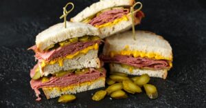 Tasty Pastrami Sandwich with Pickles and Cheese