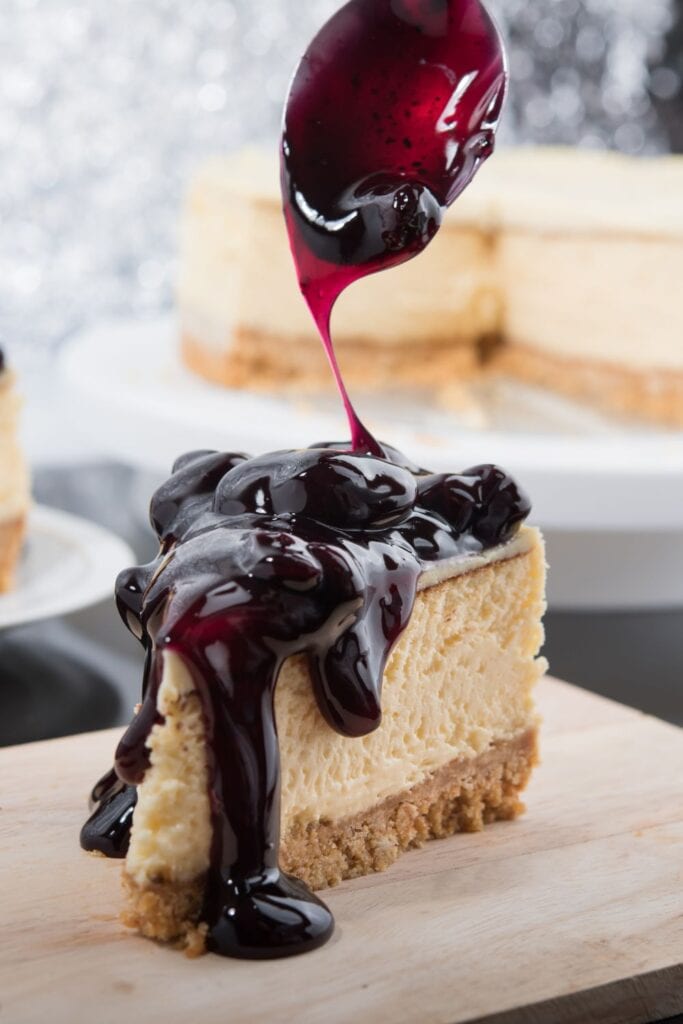A Slice of Cheesecake with Blueberry Pie Filling