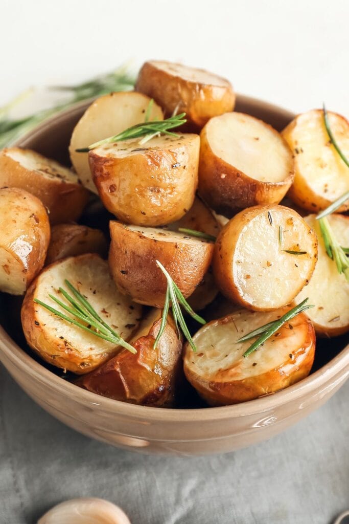 Bowl of Baked Yukon Gold Potatoes with Fresh Rosemary