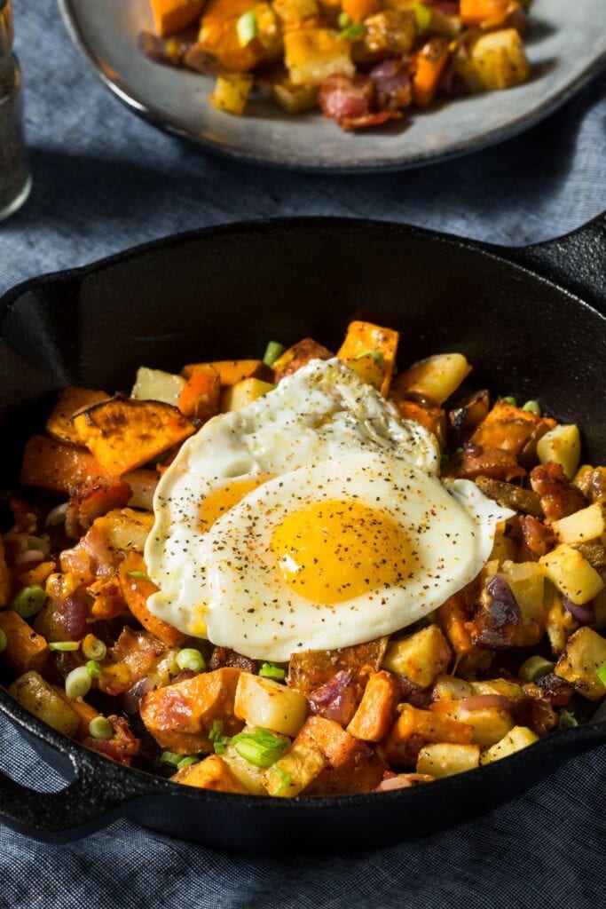 Breakfast Sweet Potato Hash with Fried Eggs and Bacon