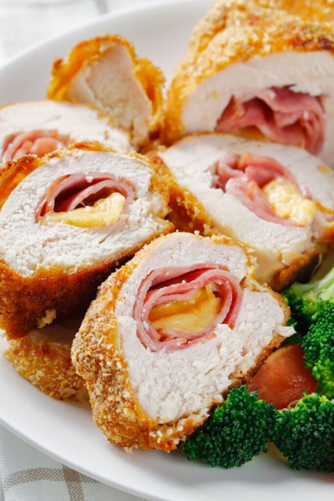 25 Swiss Cheese Recipes Missing From Your Life. Shown in picture: Chicken Cordon Bleu with Cheese, Ham and Broccoli
