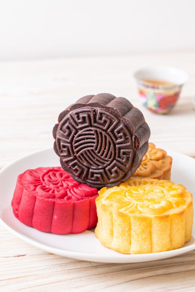 Colorful Chinese Mooncakes on a White Plate