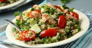 Healthy Tabbouleh Salad with Tomatoes, Cucumber and Tuna in a Plate