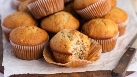 Homemade Banana Bread Muffins in a Wooden Cutting Board