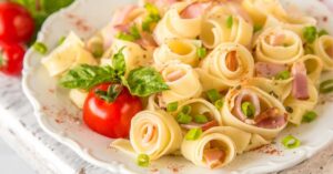 Homemade Fettuccine Pasta with Ham and Tomato