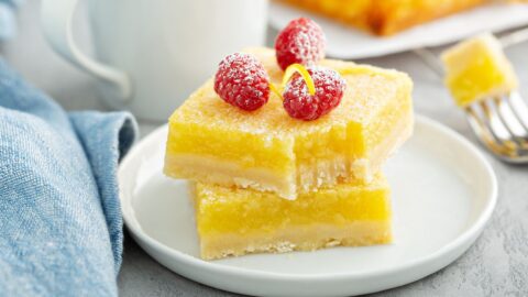 Homemade Lemon Bars Topped with Fresh Raspberries