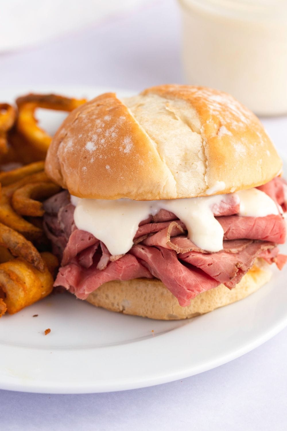 Homemade Sandwich with Ham, Fries and Horseradish Sauce