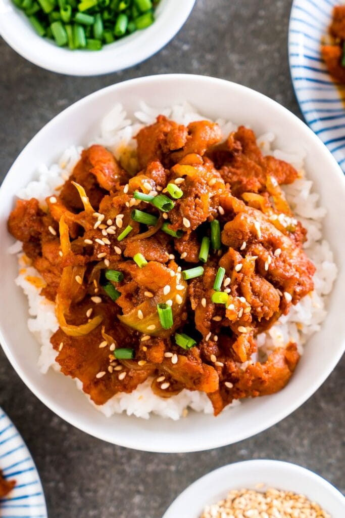 20 Best Korean Beef Recipes (Quick & Easy): Korean Bulgogi: Fried Pork with Rice and Green Onions