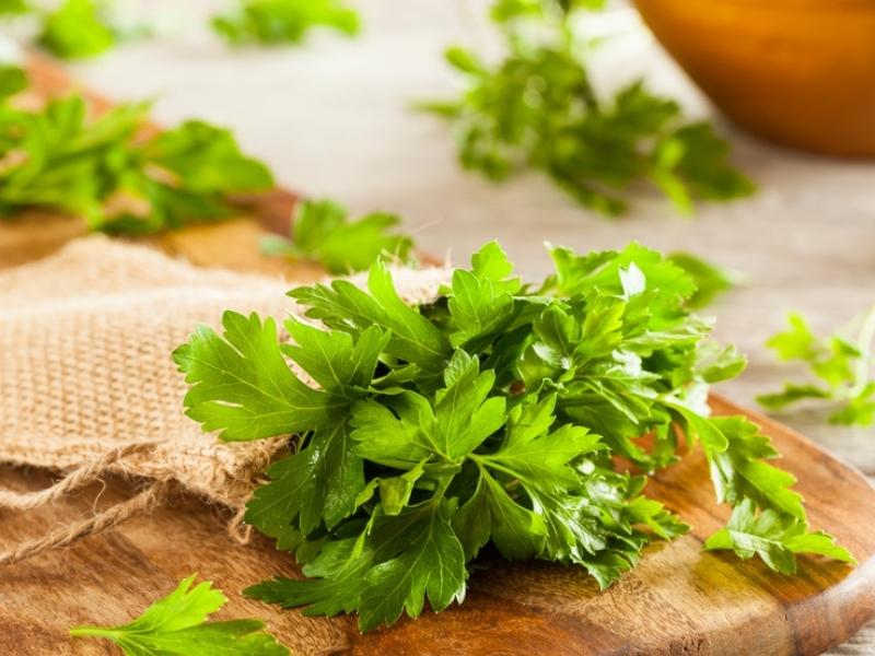 Parsley in a Wooden Chopping Board