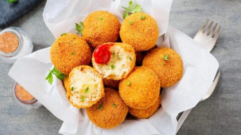 Risotto Rice Balls with Cheese and Tomato Sauce