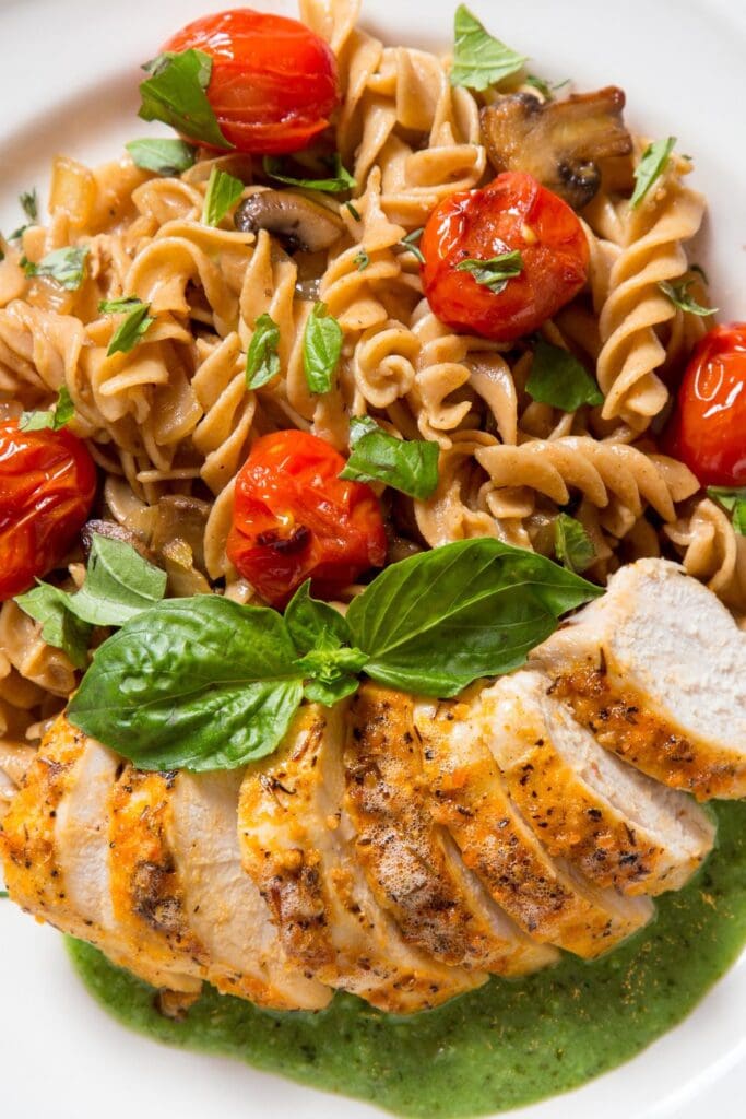 25 Easy Rotini Pasta Recipes For Dinner: Rotini Pasta with Chicken and Tomatoes