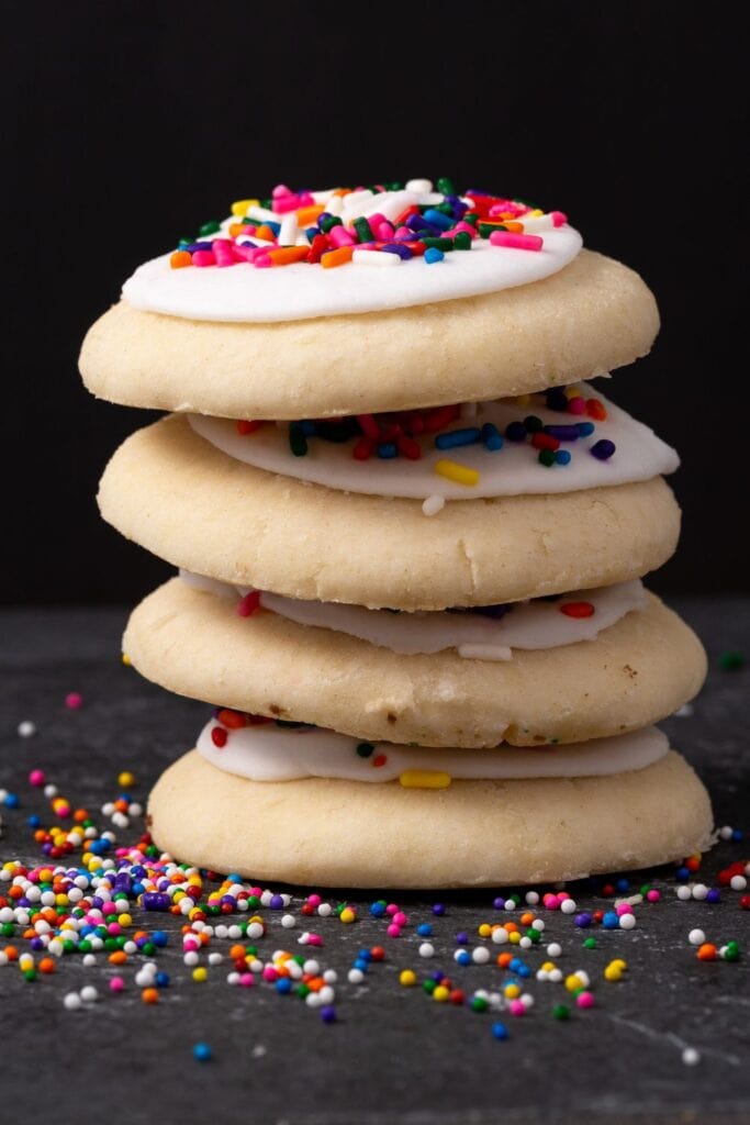 Sweet Sour Cream Sugar Cookies with Vanilla Icing and Sprinkles
