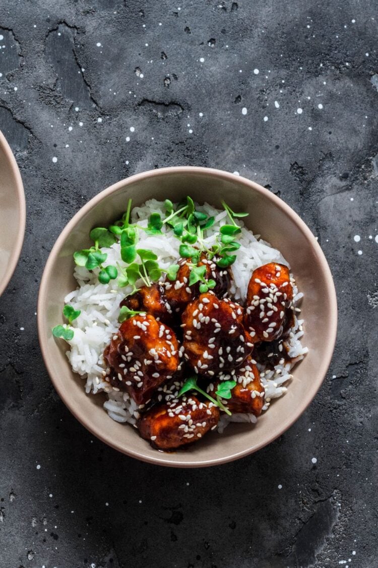 20 Healthy Chicken Bowl Recipes You Ll Love Insanely Good   Teriyaki Chicken With Sesame Seeds Rice And Greens In A Bowl 750x1125 