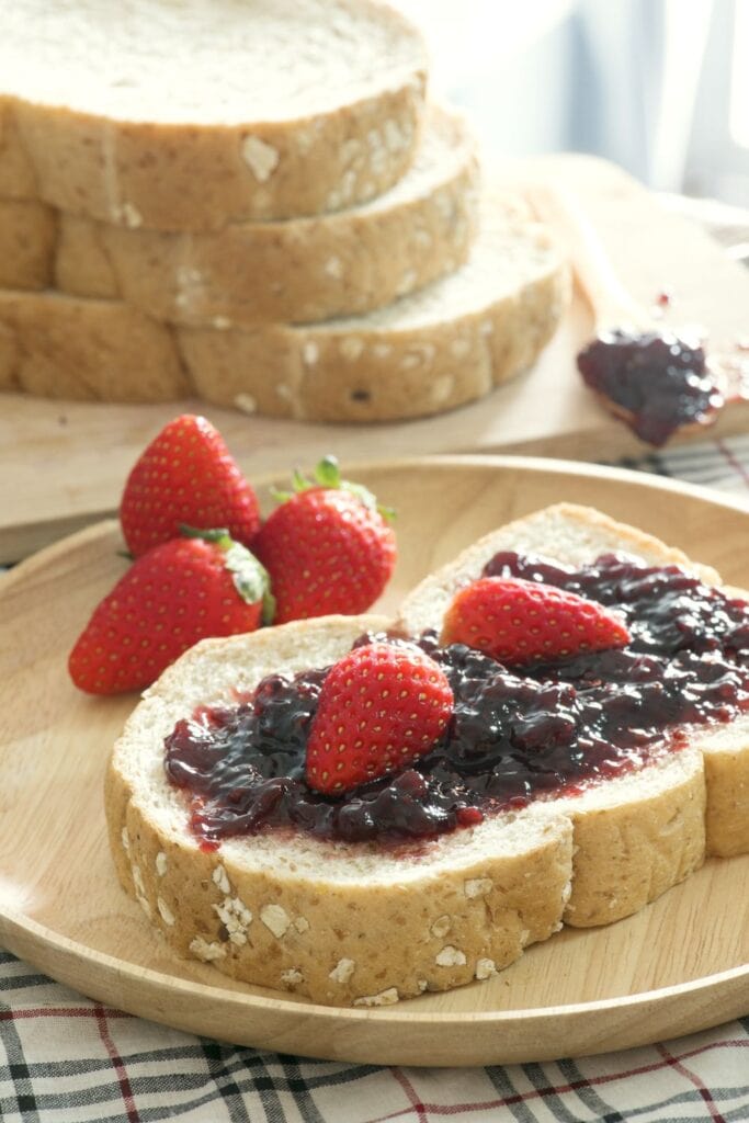 25 Hearty Whole Wheat Flour Recipes You'll Love: Whole Wheat Bread with Jam and Strawberries