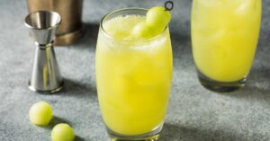 Boozy Melon and Honeydew Cocktail with Lime and Gin in Glass
