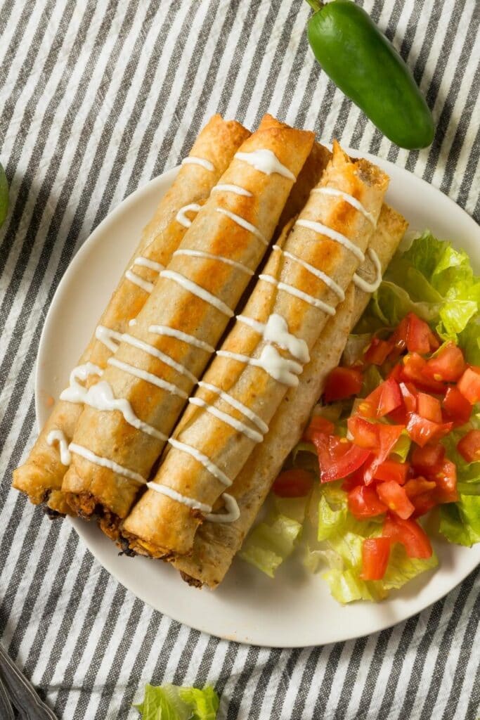 Chicken Taquitos with Tomatoes and Lettuce