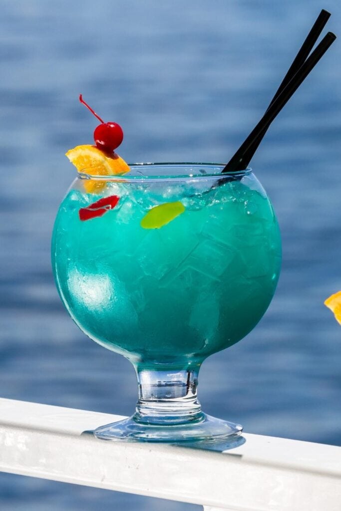 Fish Bowl Cocktail with Blue Curacao, Cherry and Orange