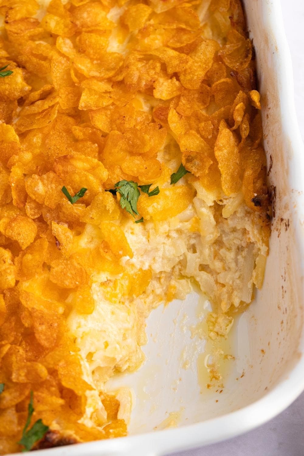 Homemade Funeral Potatoes Casserole with Hash Browns, Cream Sauce, Cheese and Cornflakes