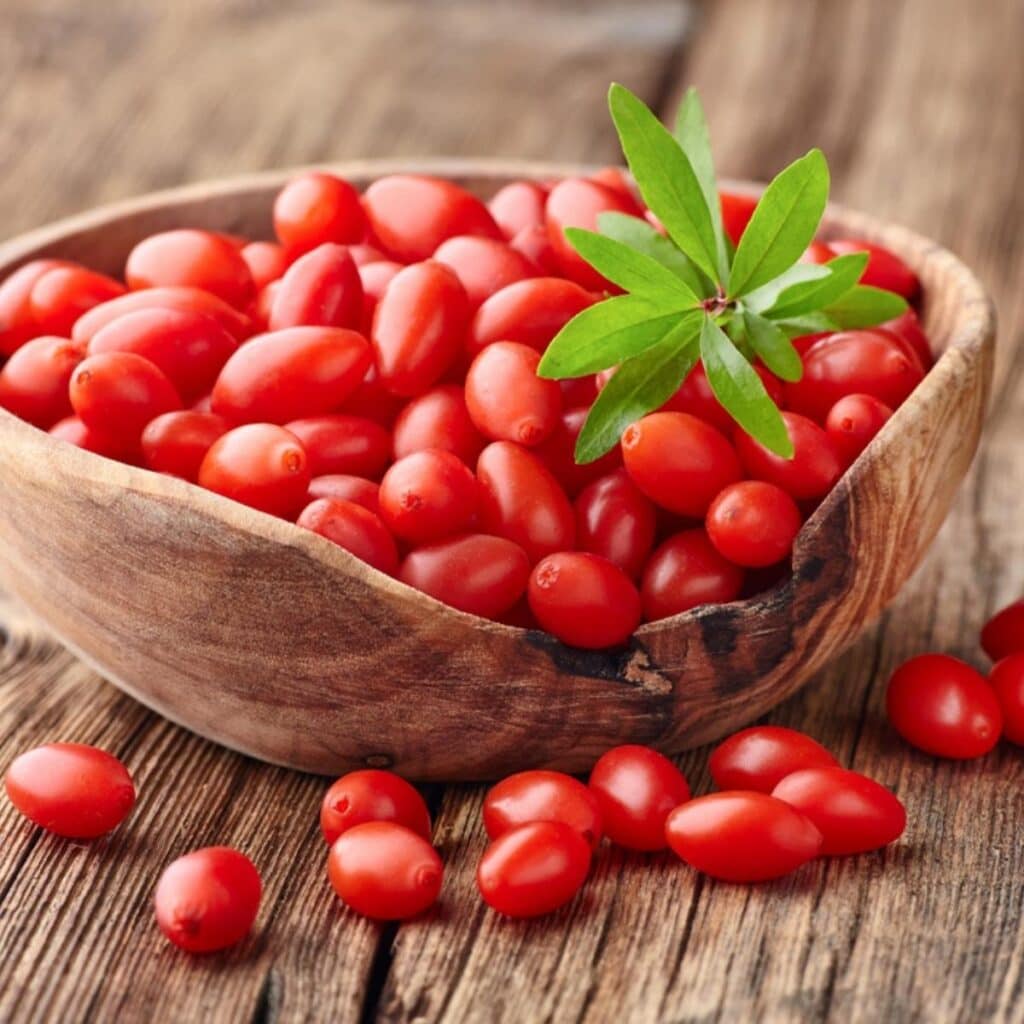 Goji Berries on a Wooden Bowl