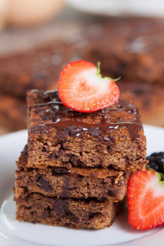 Healthy AIP Brownies with Chocolate Chips and Fresh Strawberries