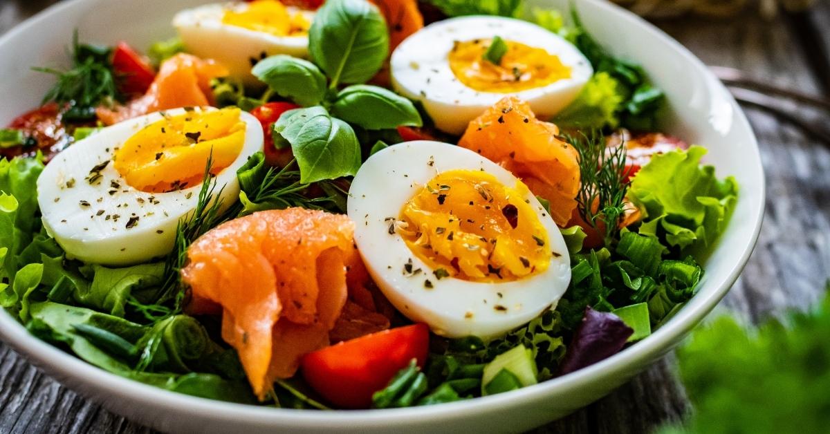 Healthy Salmon Salad with Green Vegetables and Eggs for Breakfast