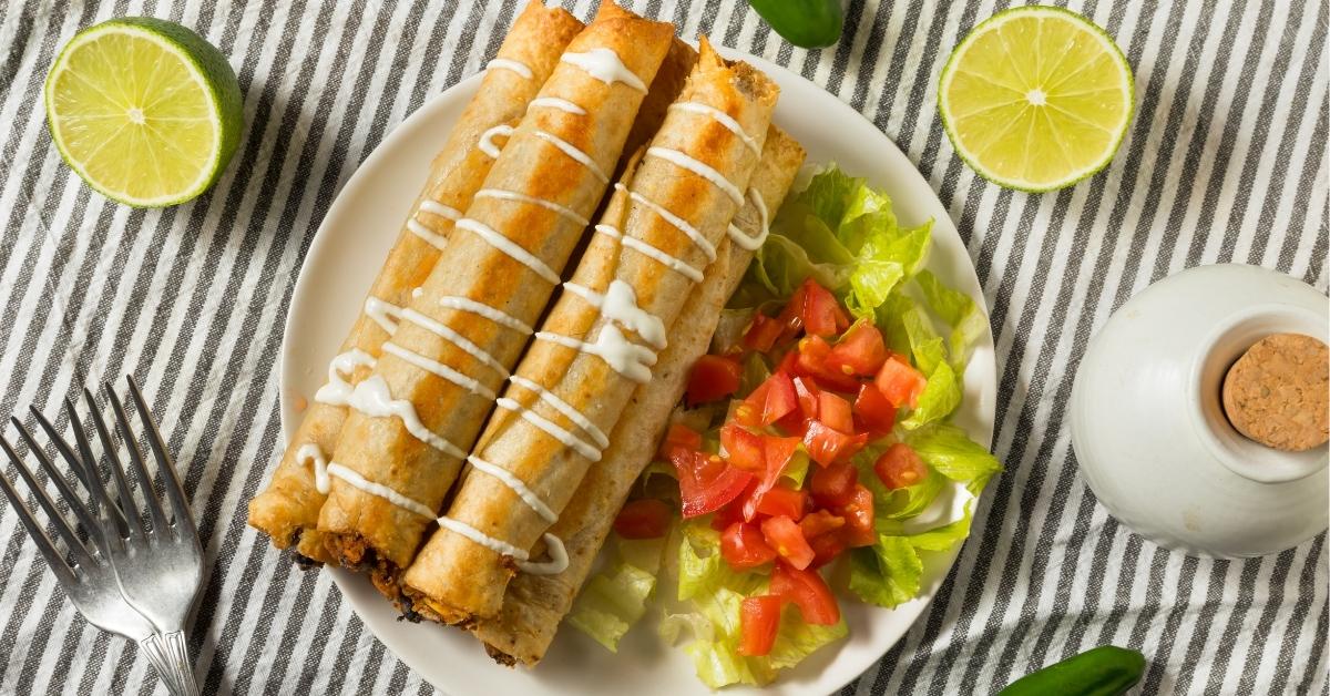 Homemade Chicken Taquitos with Lime, Tomatoes and Lettuce