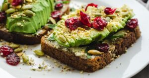 Homemade Healthy Avocado Toast with Dried Cranberries and Sesame Seeds